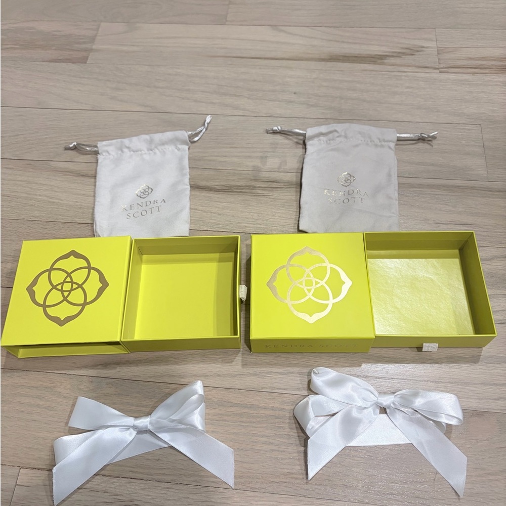 Kendra Scott Yellow Boxes with White Ribbons